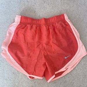 Coral and pink nike shorts